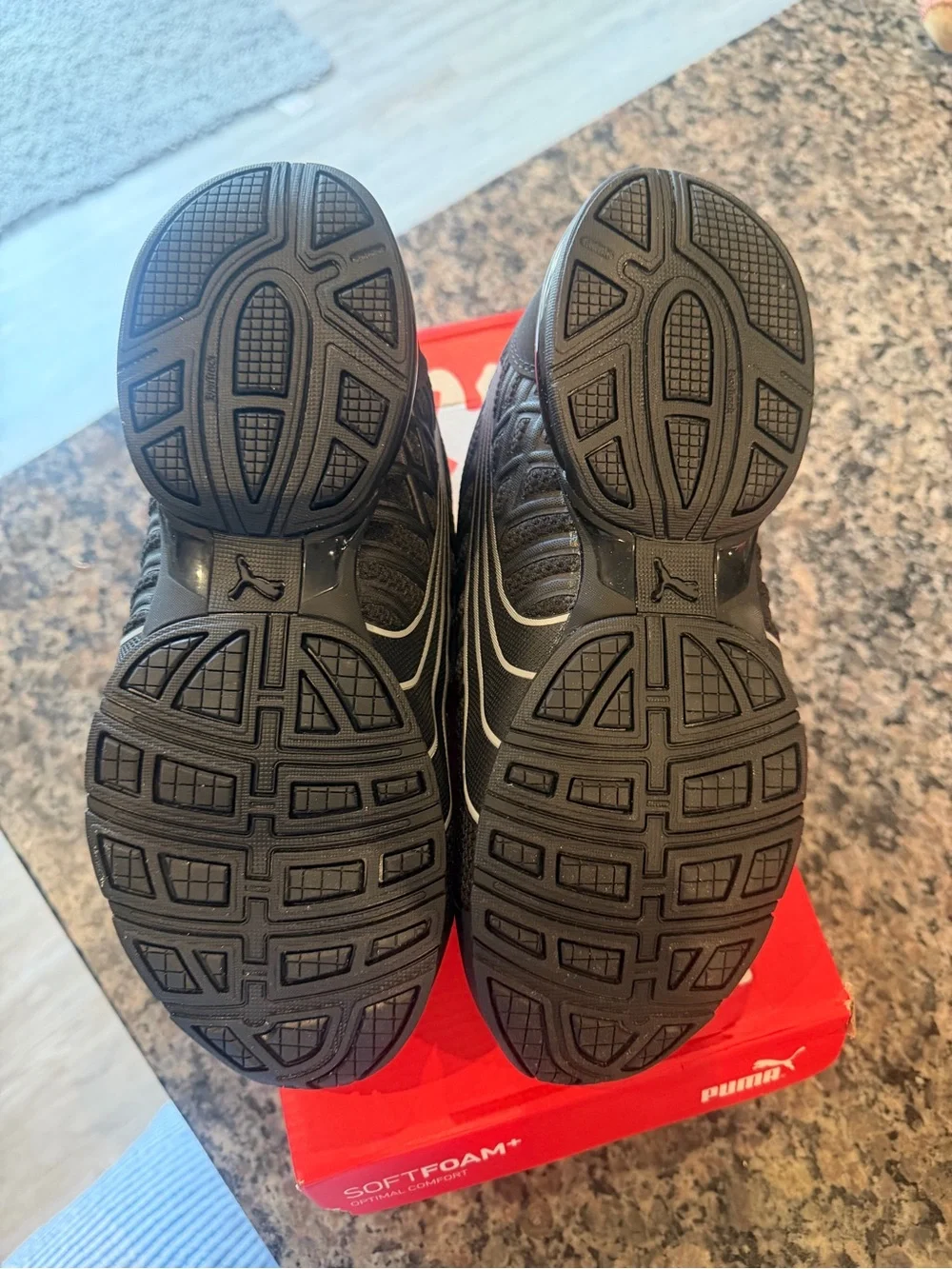 Puma Kids Black Sneaker with Silver Stripe Accents